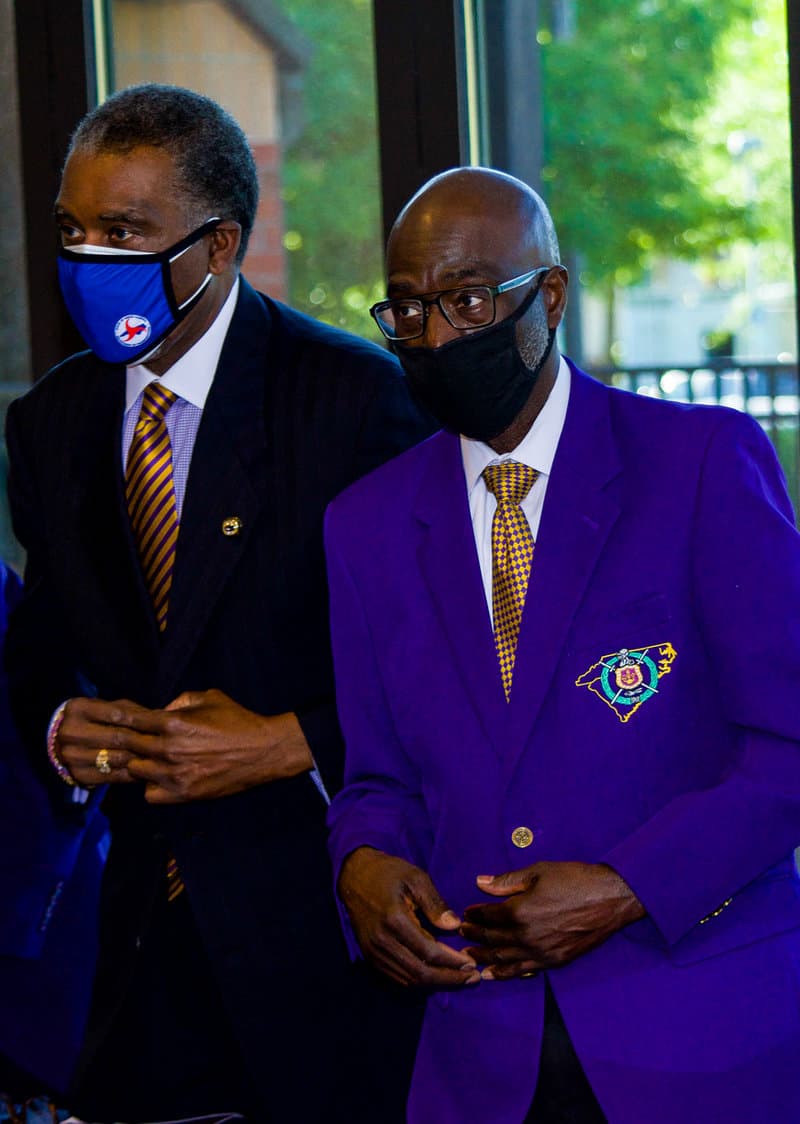 Iota Nu Nu members engaged in a chapter activity